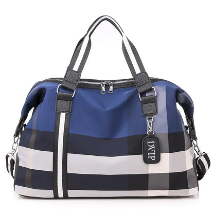 Blue, black, and white checkered bag with a visible brand tag on a white background