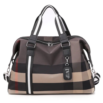Plaid patterned handbag with visible brand logo on a white background
