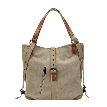 Beige handbag with brown straps on a white background