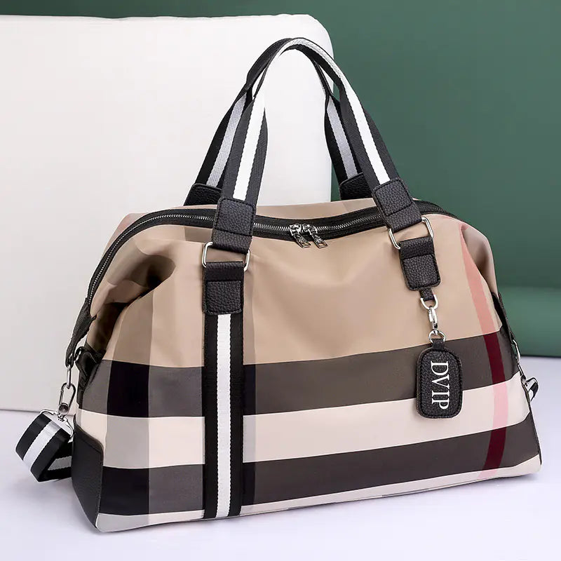Striped handbag with a visible brand tag on a light background