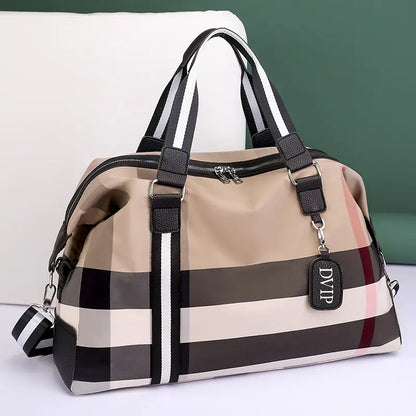 Striped handbag with a visible brand tag on a light background